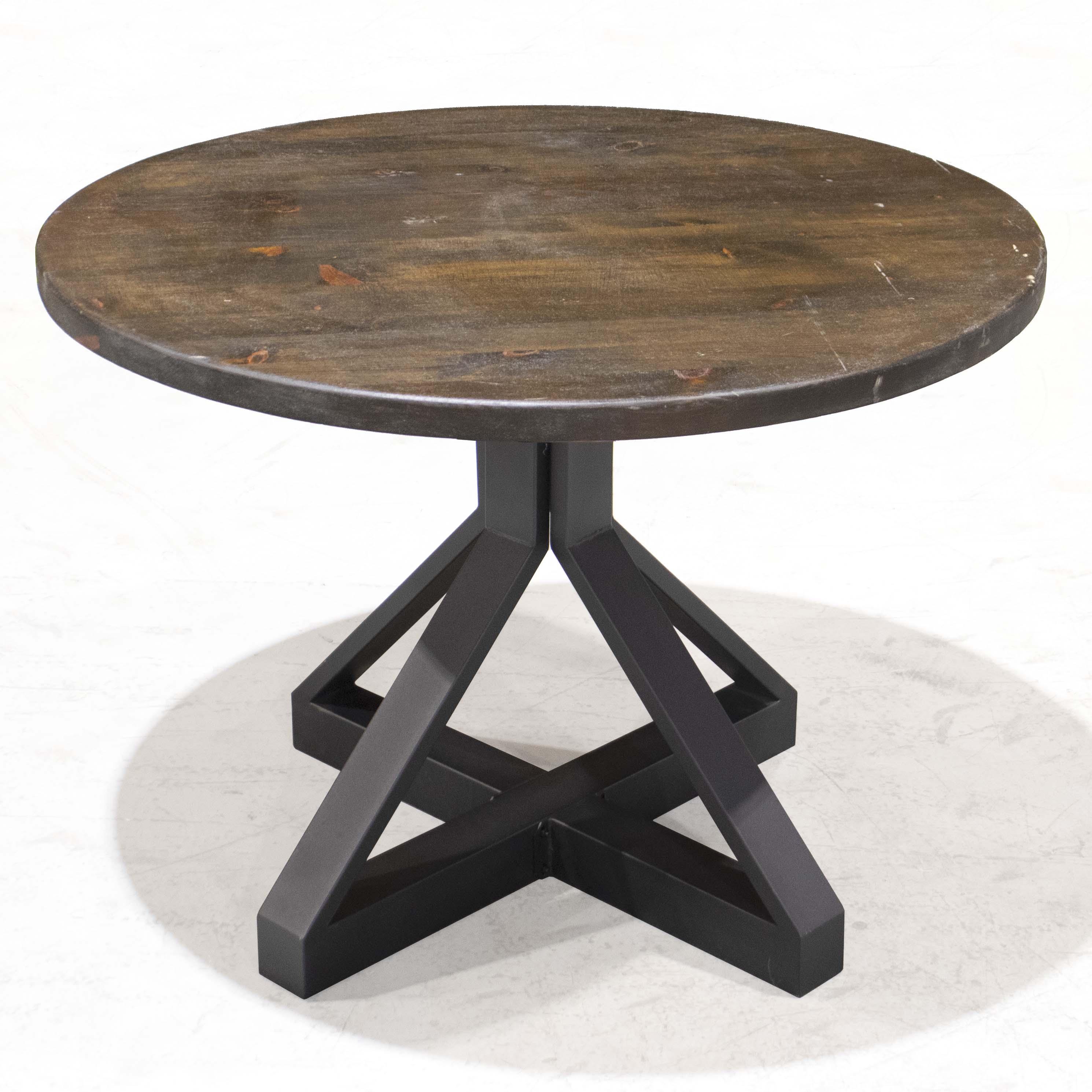 Full view of SS006 Round-Z shaped table leg supporting a round table top for dining settings.