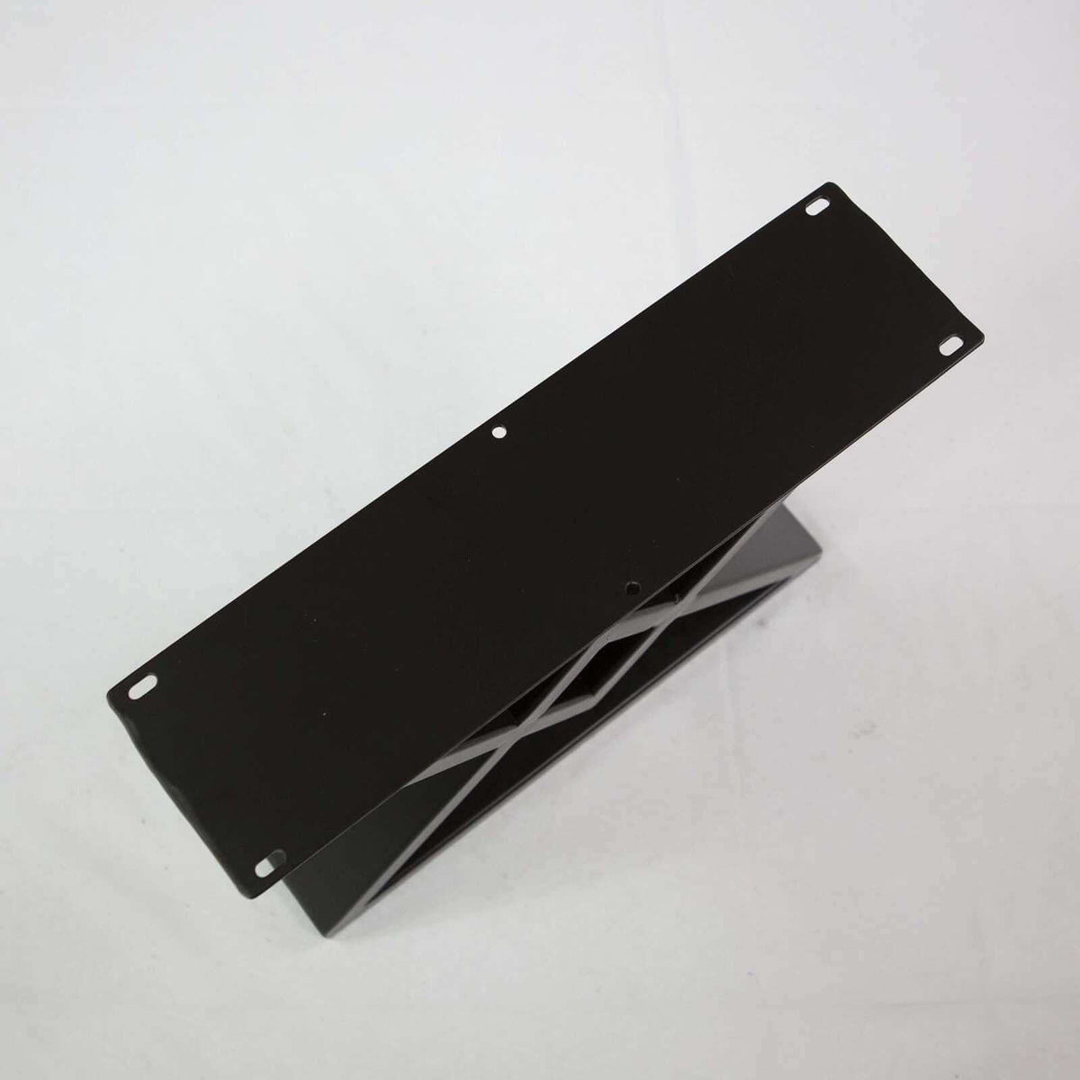 Set of dark metal coffee table leg mounting plates with screws holes