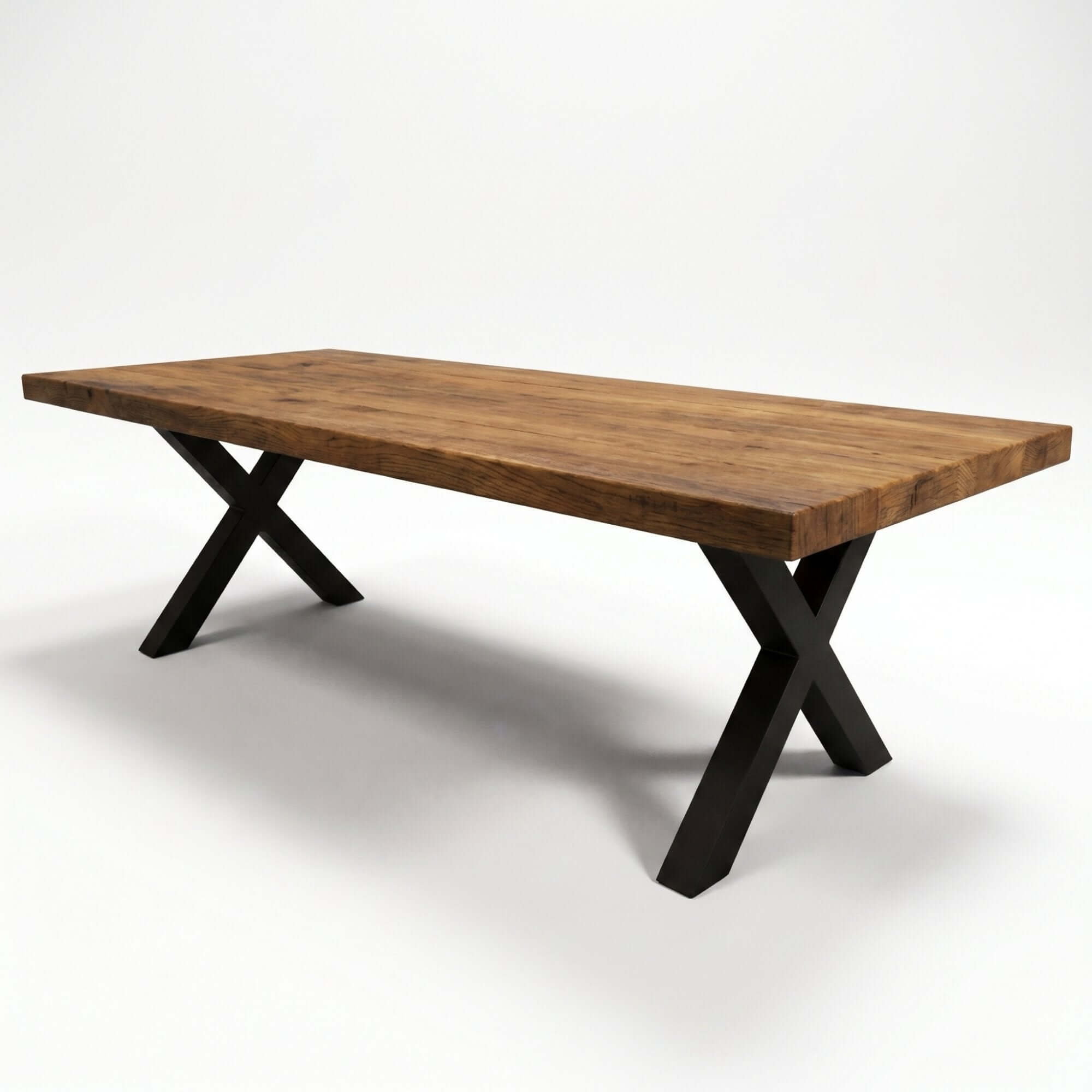 Extendable dining table with wooden top and dark X-shaped metal base