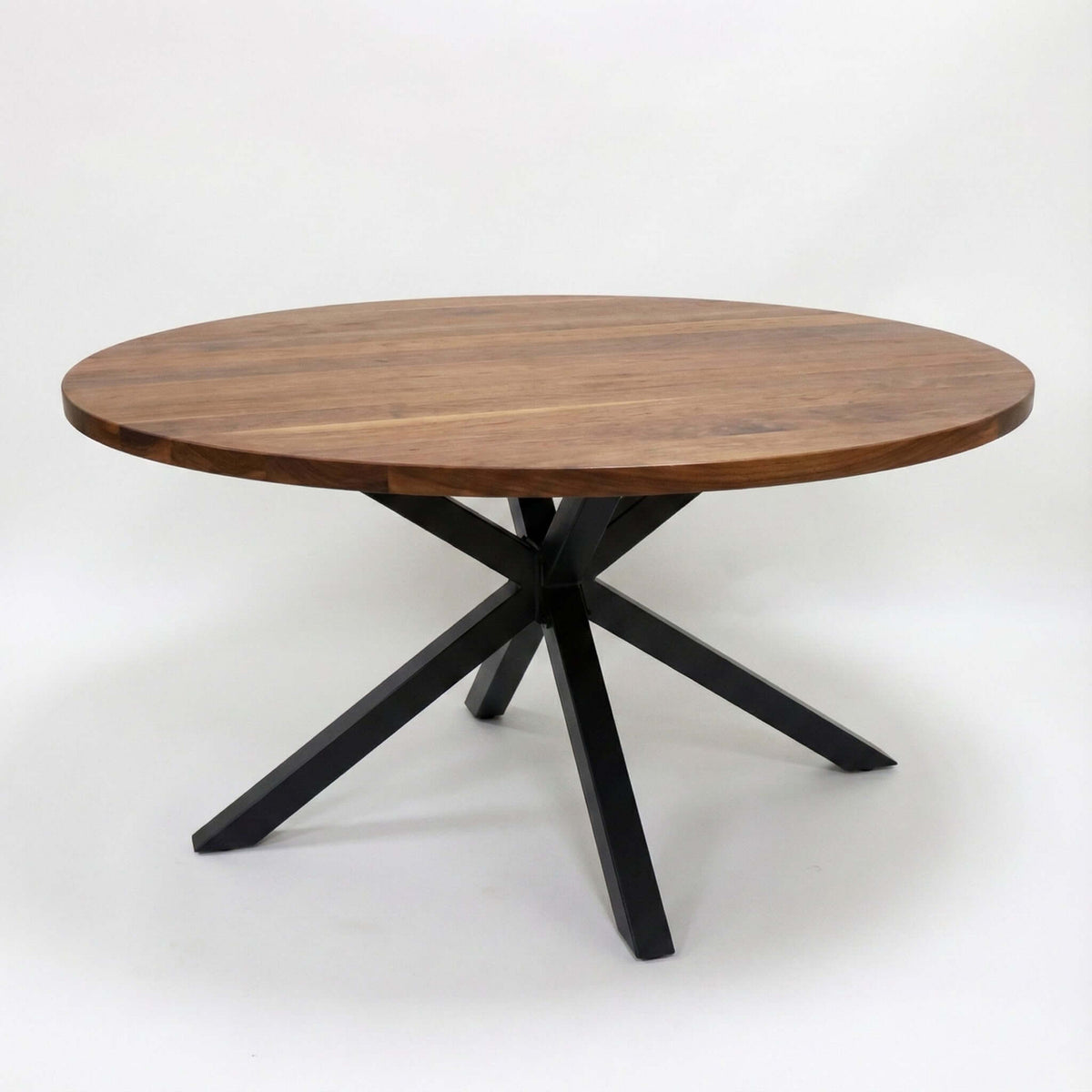 Round dining table base with spider-shaped legs and wood top