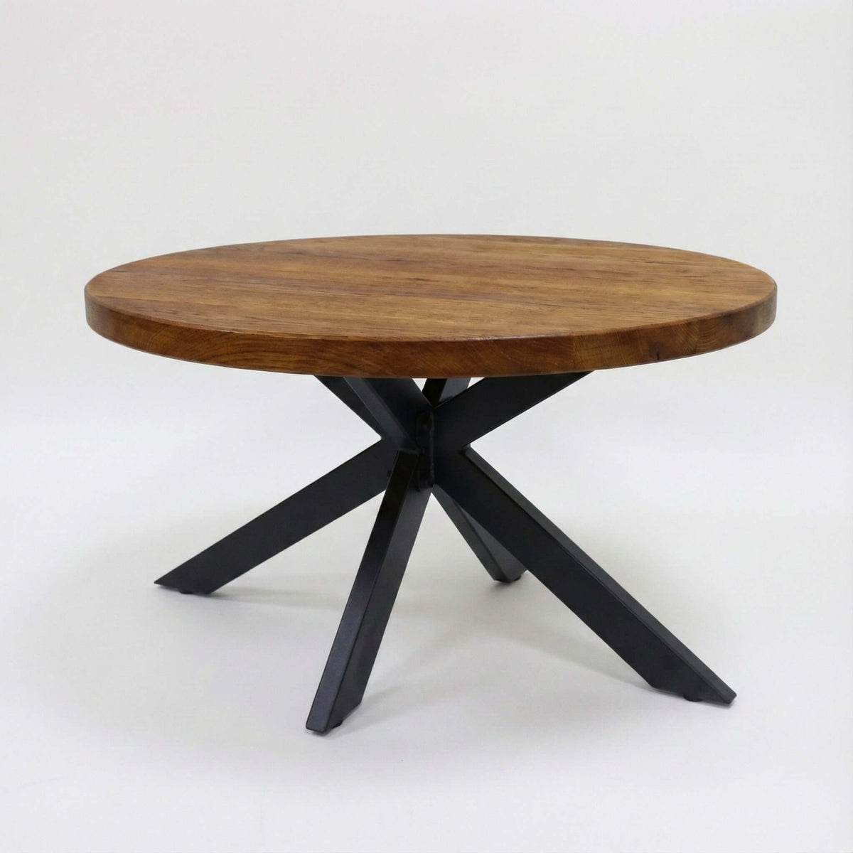 Coffee table base with round wooden top and black spider legs
