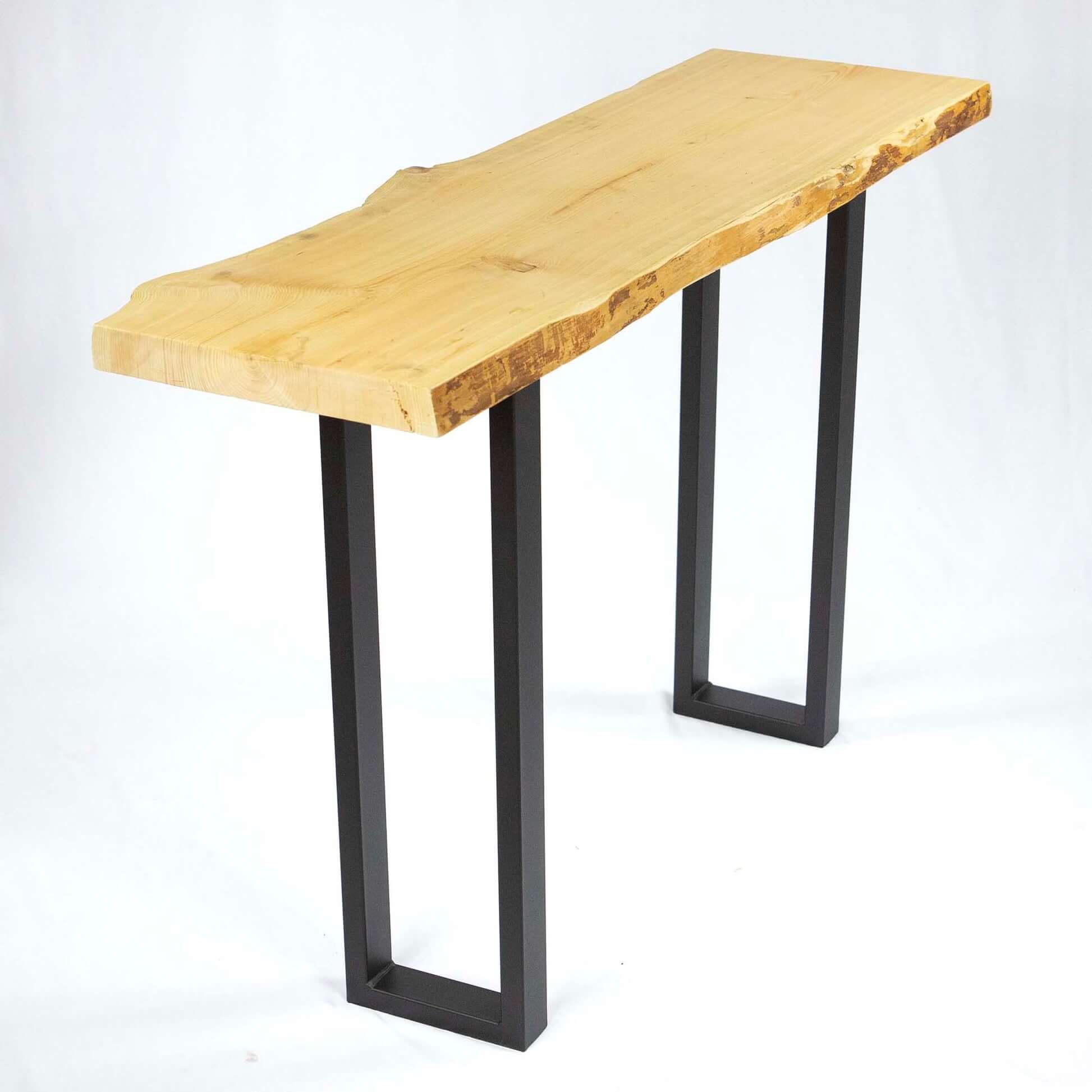 Fully assembled W5033H28 narrow console table legs supporting a long wooden tabletop.