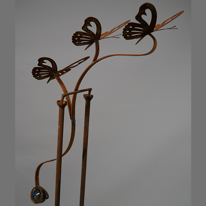 *W3560 Rocking stake of butterflies and a glass ball