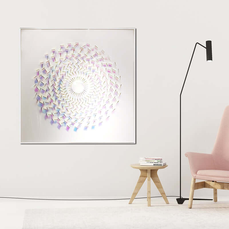 Square framed wall art with purple-blue rainbow swirl and bright white circular center