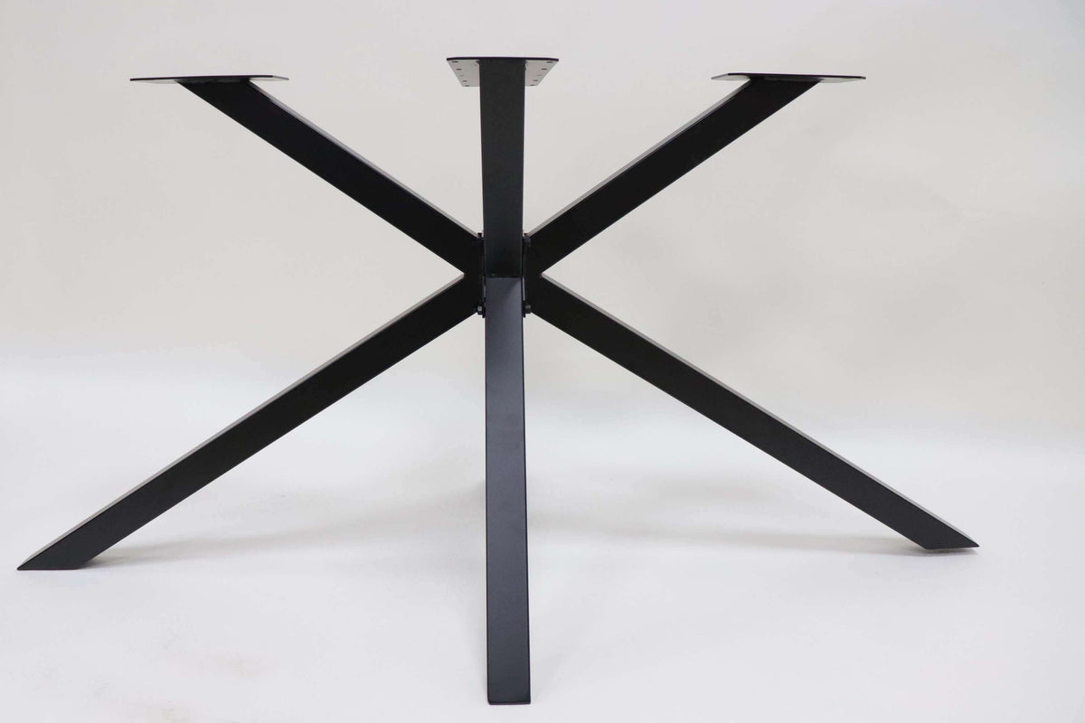 Spider dining table base with five matte-black legs and central support column.