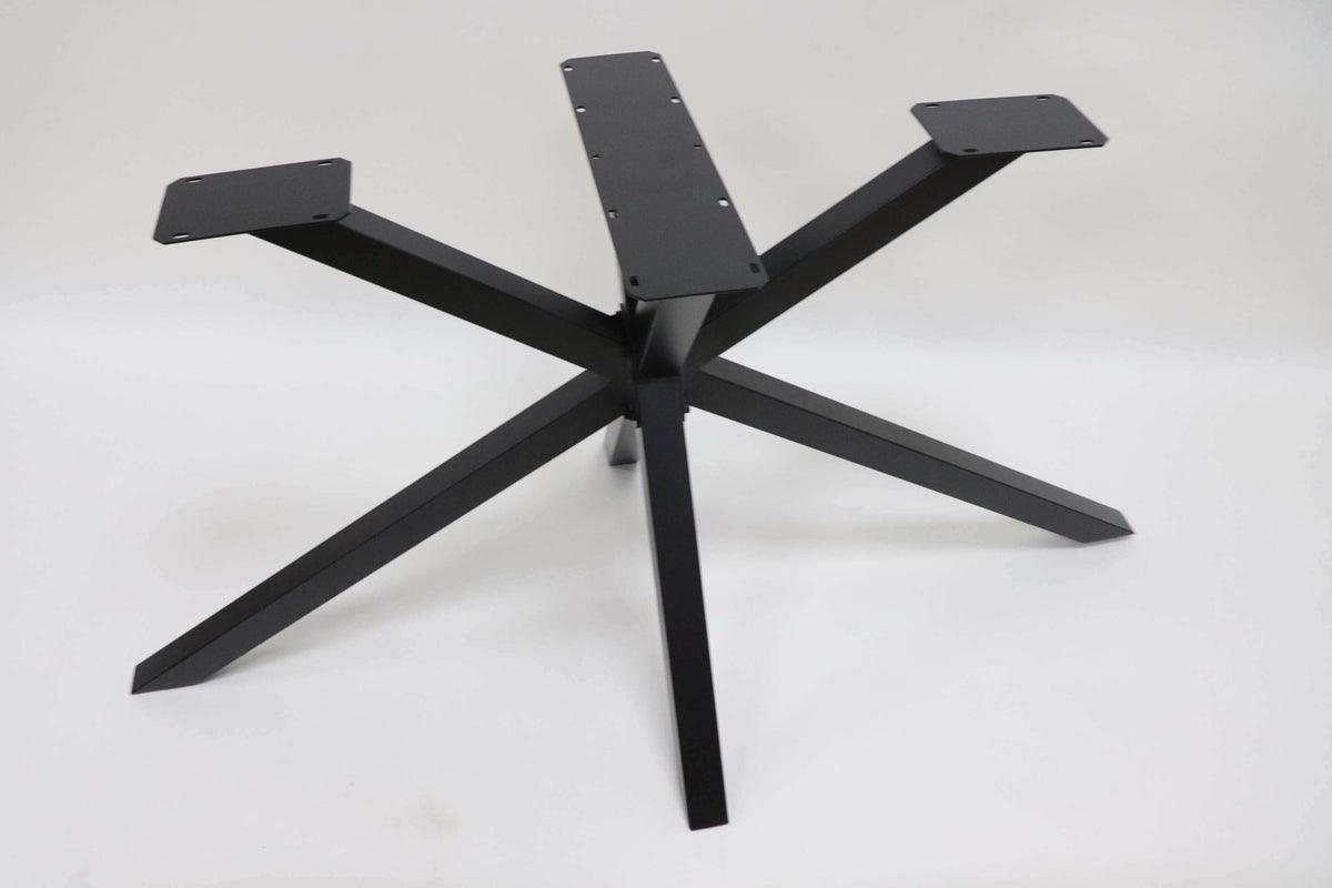 Matte-black spider table base with five splayed legs and top mounting plates.