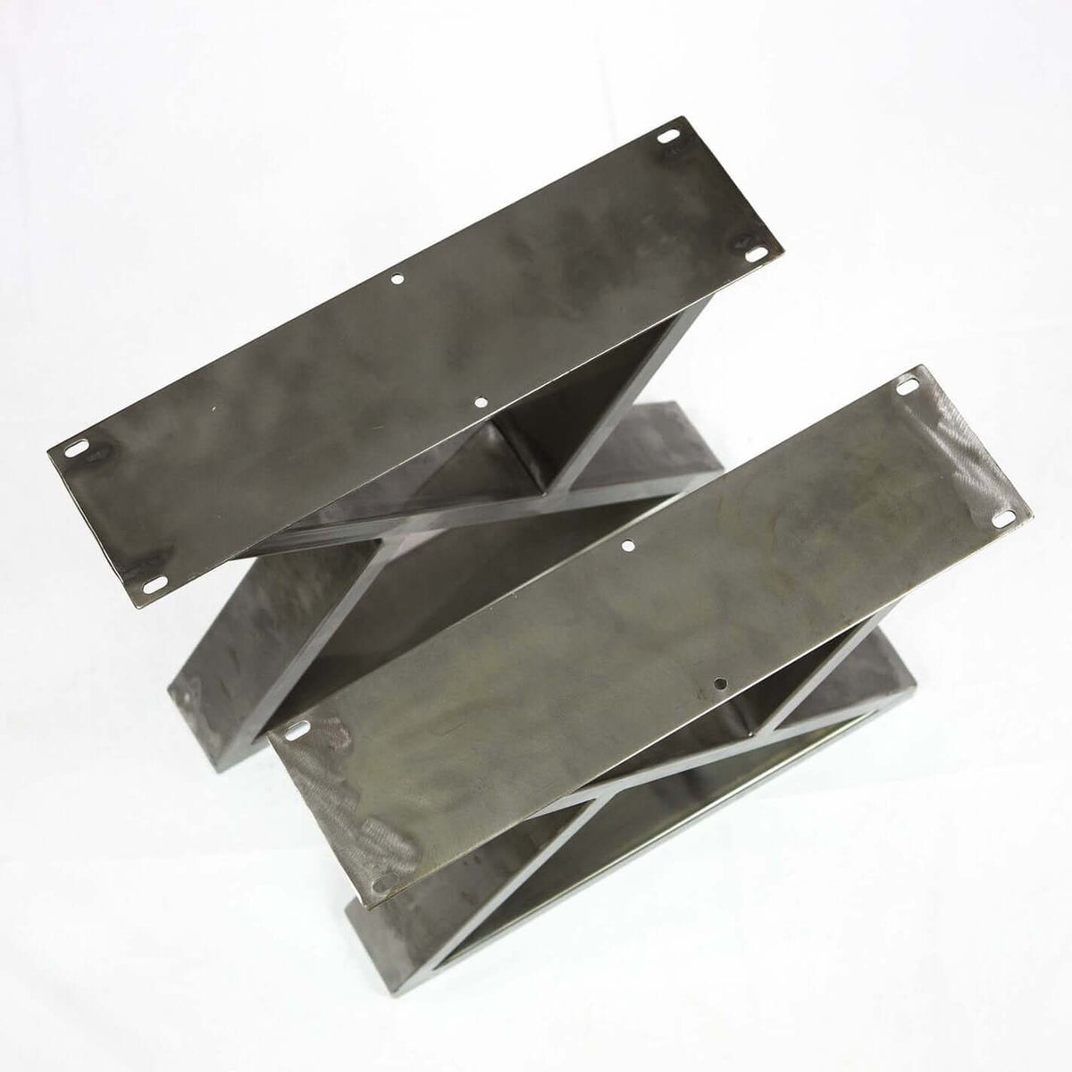 Z-shaped coffee table legs, dark gray steel with scuff-finished surfaces