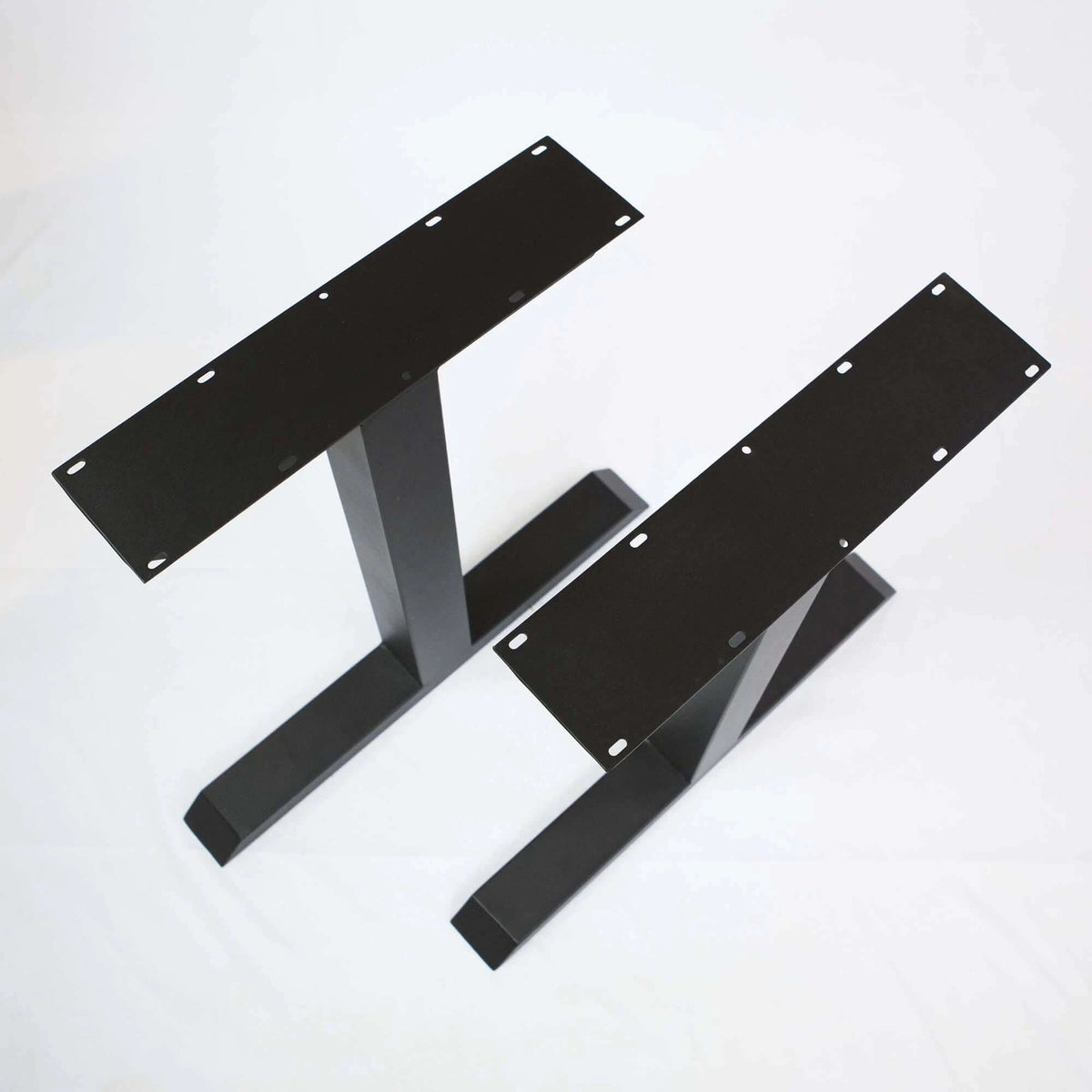 Black powder-coated T-shaped table legs with mounting plates and holes, set of 2