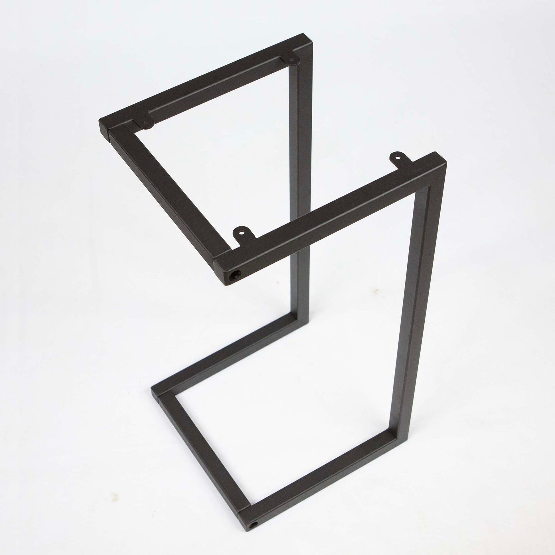 Square top C-shape side table base with sleek, modern design, featuring a sturdy metal frame in a minimalist style.