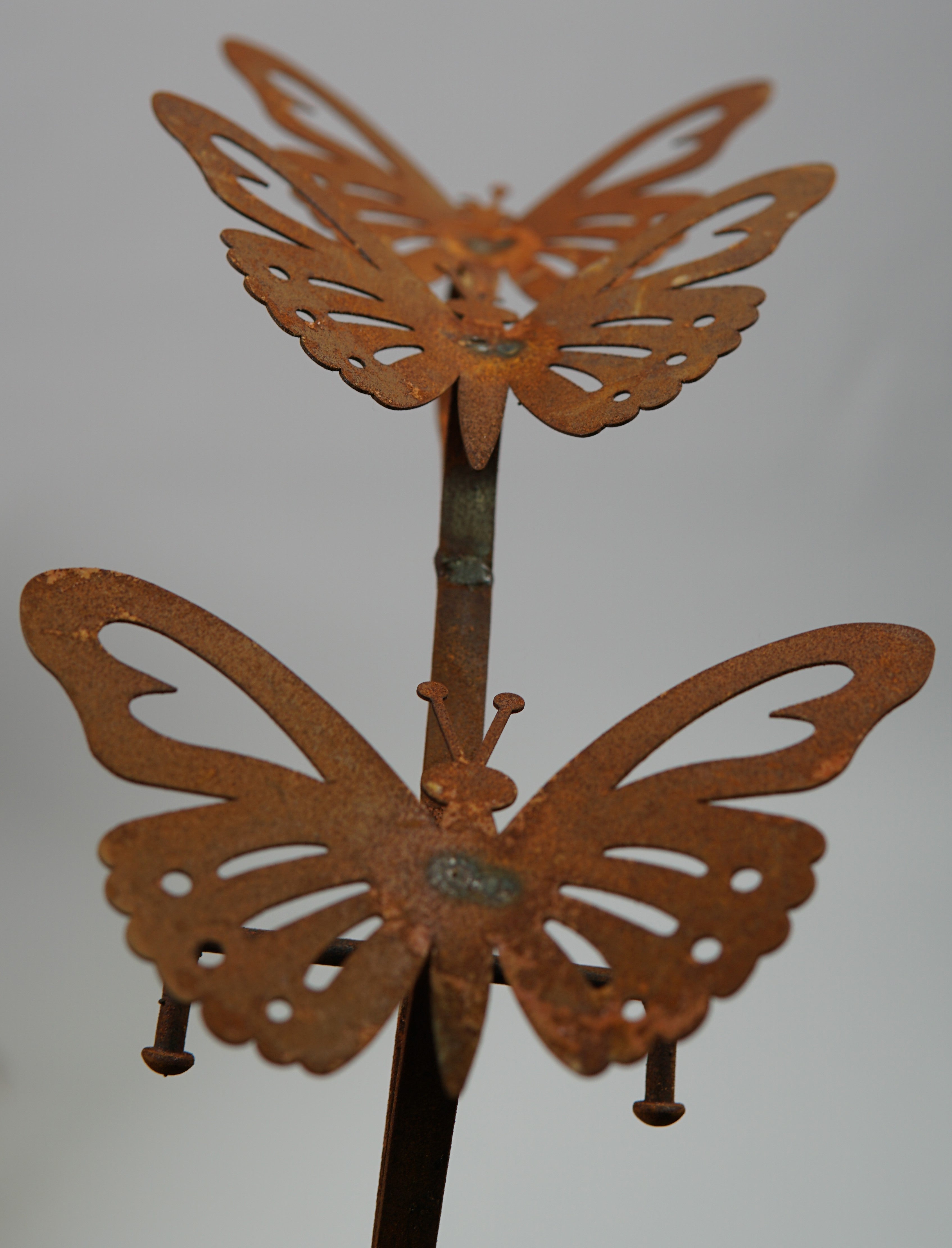 *W3560 Rocking stake of butterflies and a glass ball